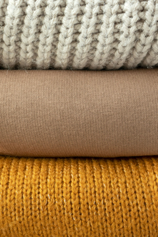 Close-up of gray knit fabric texture